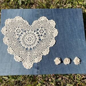 Denim wall hanging. Heart doily & fabric flowers 11” x 14”
